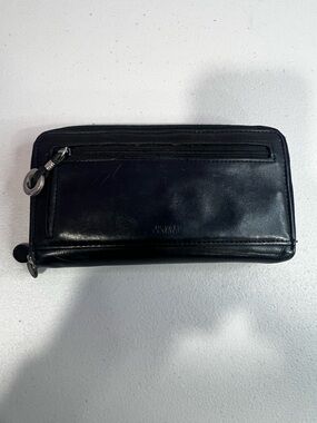 Black Wilson’s Leather Zip Around Woman’s Wallet